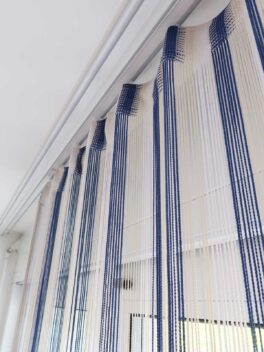rideaux à franges LAZISE bleu-blanc-beige patins côté