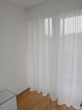 Voilage AMIRA Fischbacher 1819 - Rideau fermé lateral